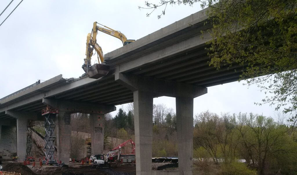 PDI was contracted in 2017 to remove the Morningside Bridge in 2 phases. The bridge was six spans (4 spans of 100’, and 2 spans of 85’) and averages 100’ above the ground and river below.