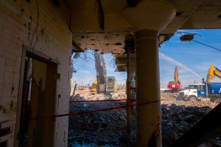 Water Truck Spraying Demolition Site At Campbell's Soup Plant
