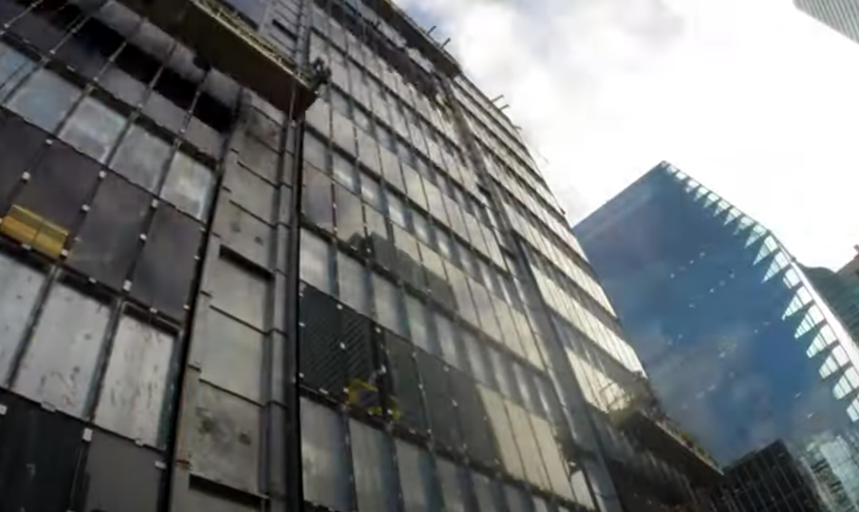 Removal of exterior cladding from 120 Adelaide and 130 Adelaide towers