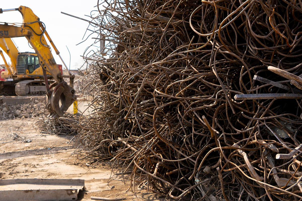 Crews sorting material on site